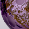 details of a handcrafted amethyst glass piece hand-cut and polish by glass artisan for home decor vases or table centrepiece