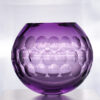 round purple glass spherical orb vase