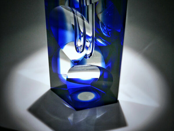 bottom of blue crystal faceted handcut glass art piece