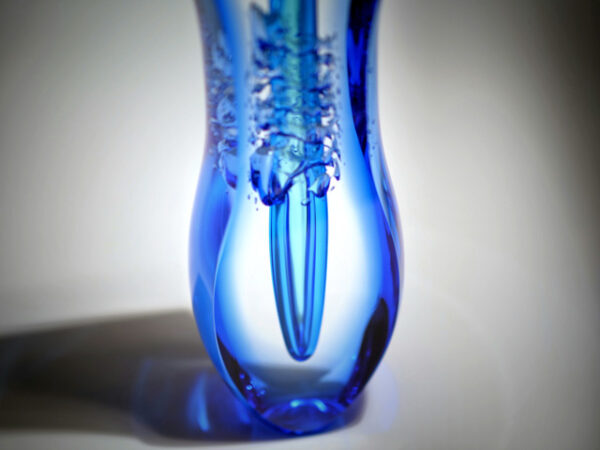 bottom of sommerso blue art glass bud vase