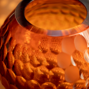 details of radiant amber glass crystal vase hand-cut and polished by hand