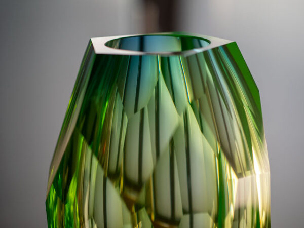 detail top view of blue uranium crystal glass faceted vase hand-cut and polished by hand