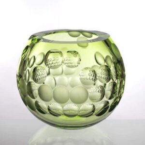 a round green sphere glass crystal piece as a vase or home decor centrepiece